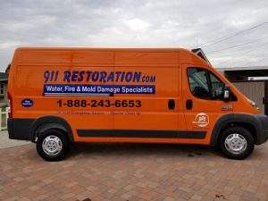 Water Restoration Truck At Residential Job Site