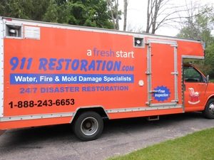 Water Restoration Truck At Commercial Job Site