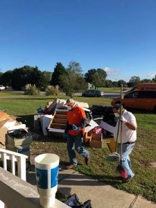 Technicians Repairing A Home After A Water Disaster