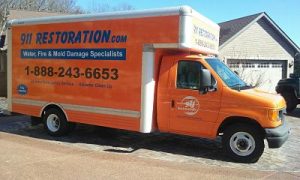 911 Restoration Truck At A Residential Job Site