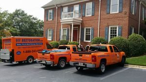 911 Restoration Fleet At A Residential Job Site